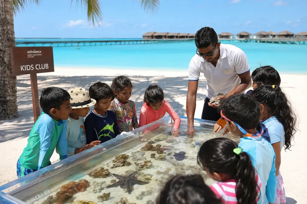 Kids club marine activity at Maldives family resorts for Pakistani families summer 2026
