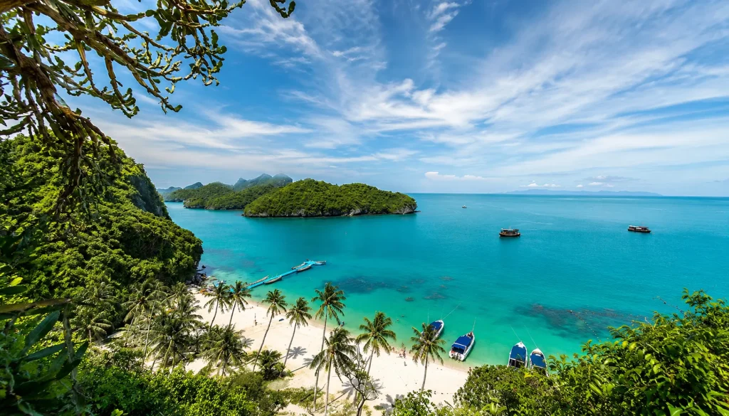 Aerial view of turquoise bay and longtail boats, Koh Samui wellness retreat island scenery