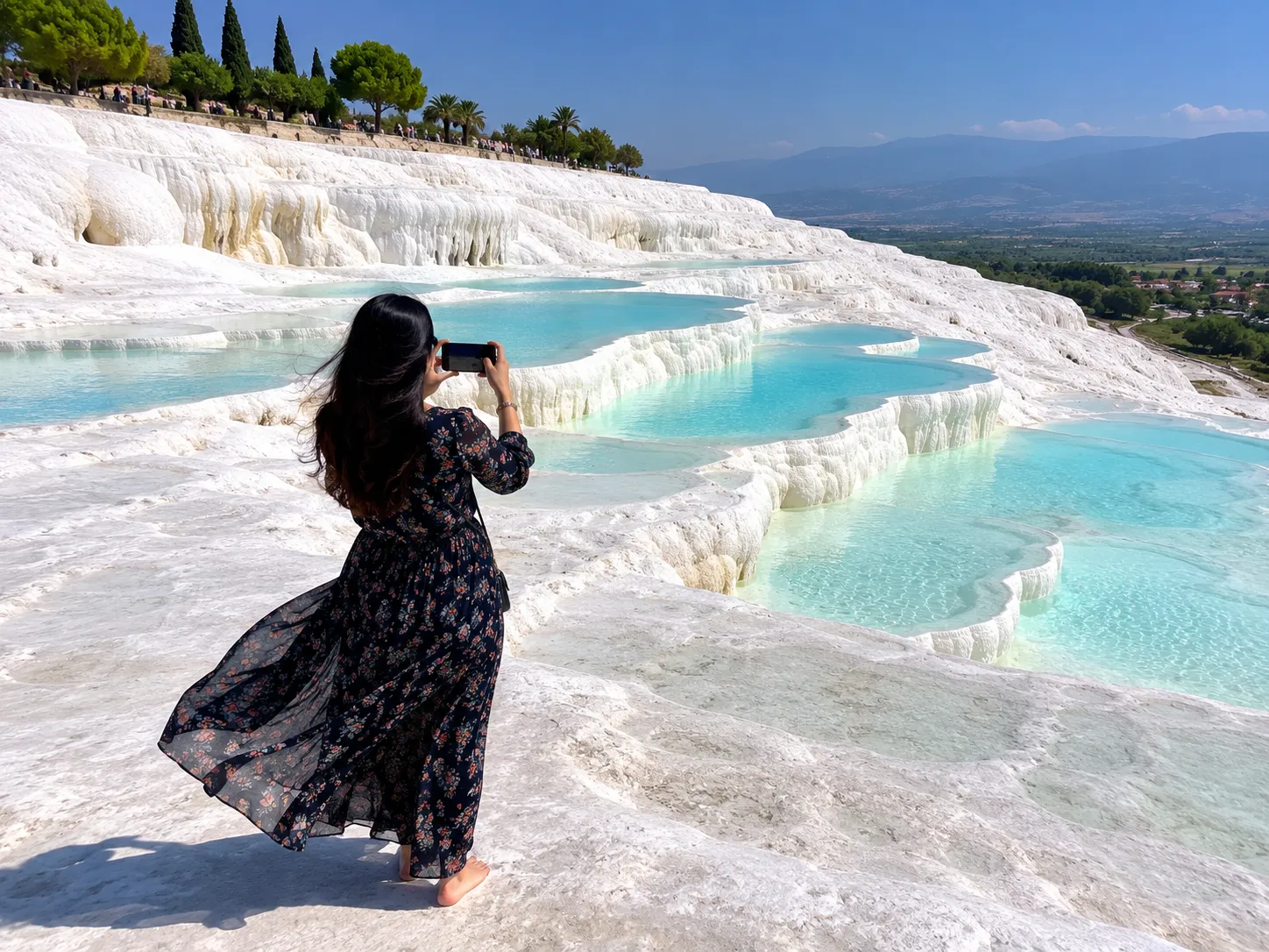 Pakistani woman photographing Pamukkale travertine pools Turkey | family trip planning guide | Pamukkale Trip