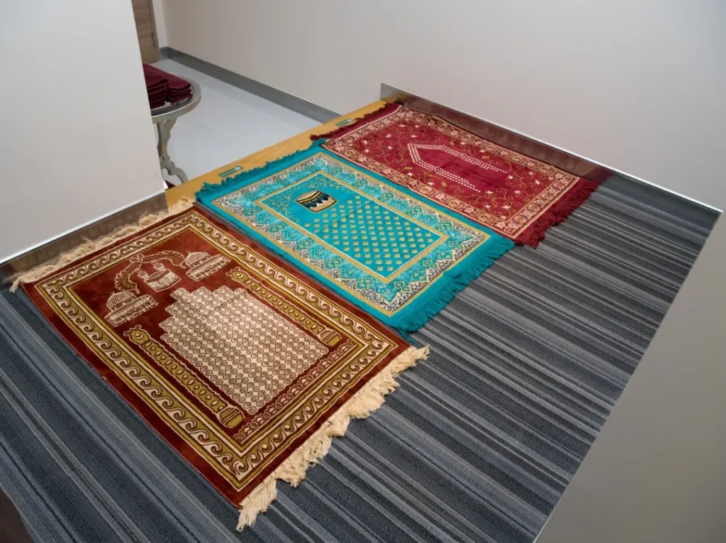 Prayer mats provided in Bangkok halal hotels room for Muslim family guests