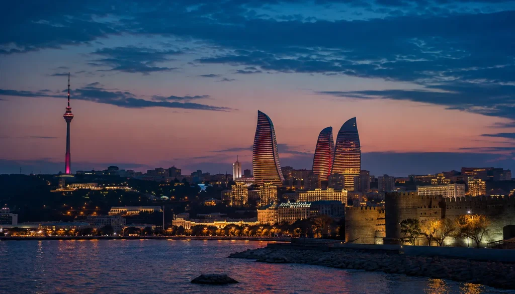 Flame Towers lit at dusk over Baku, Azerbaijan's Caspian Sea skyline