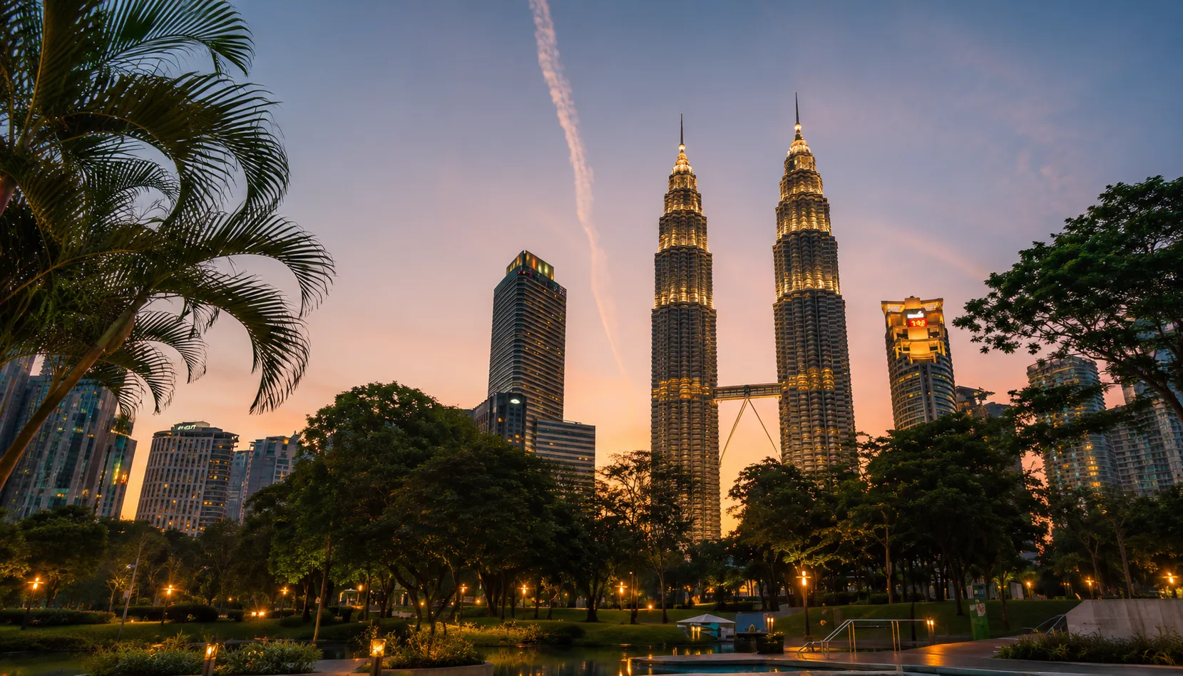 Petronas Twin Towers at sunset from KLCC Park, Malaysia eVisa for Pakistanis Kuala Lumpur