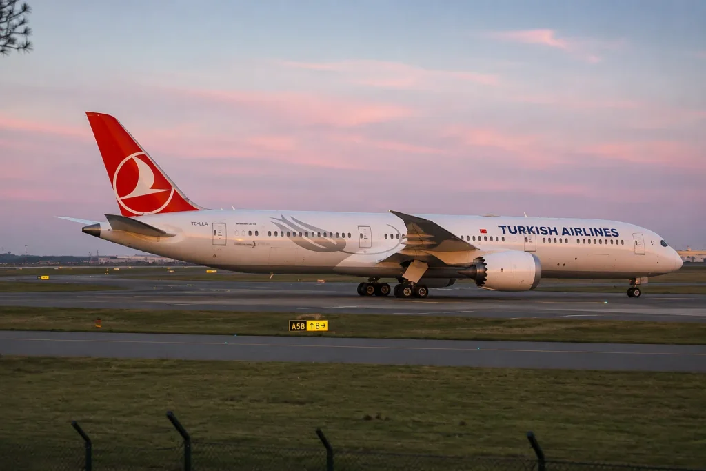 Turkish Airlines jet at dusk, the nonstop route behind Istanbul luxury hotels value from Karachi
