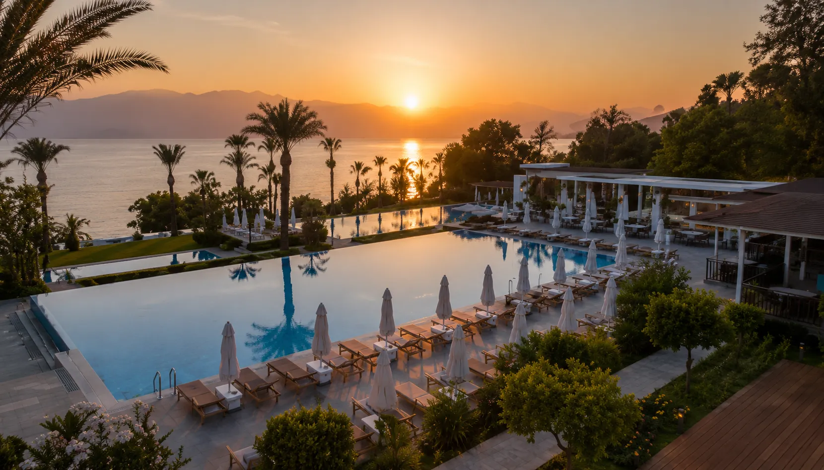 Certified eco-resort pool at sunset representing Turkey sustainable tourism standards