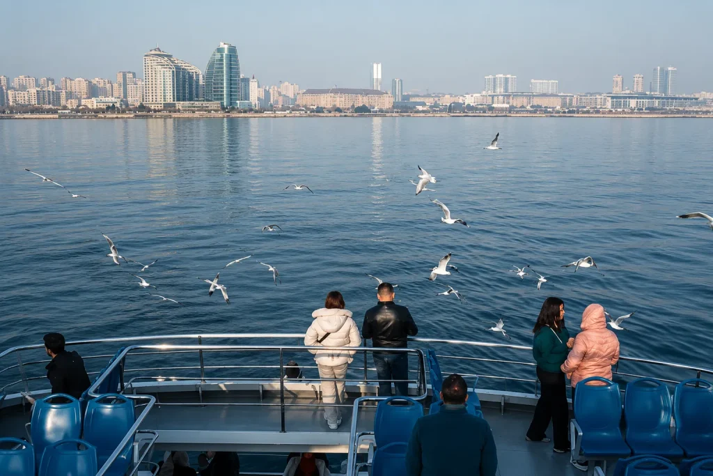 Boat ride along Baku's Caspian Sea coast with the city skyline in view