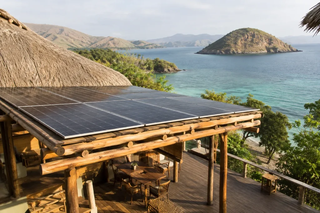 Solar panels at an Indonesia eco luxury resort overlooking a Flores island bay