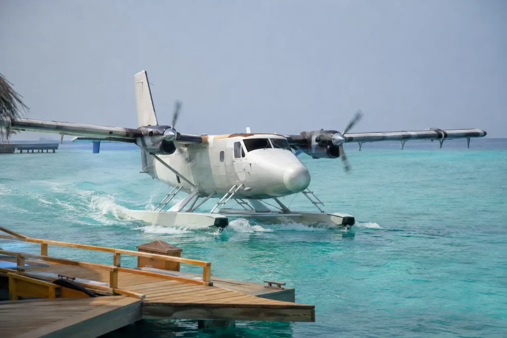 Seaplane on Maldives lagoon water, the daylight-only transfer after Karachi to Maldives flights