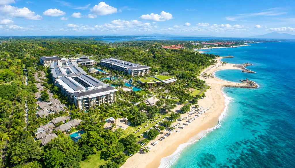 Aerial view of a Nusa Dua beach resort, the kind of split-stay booking a fixed itinerary can't flex around