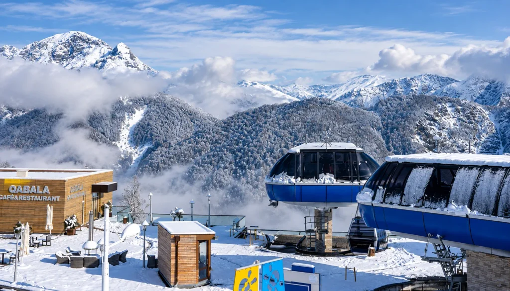Gondola cabins above Qabala's snow-covered peaks, part of Tufandag on an Azerbaijan ski trip from Pakistan