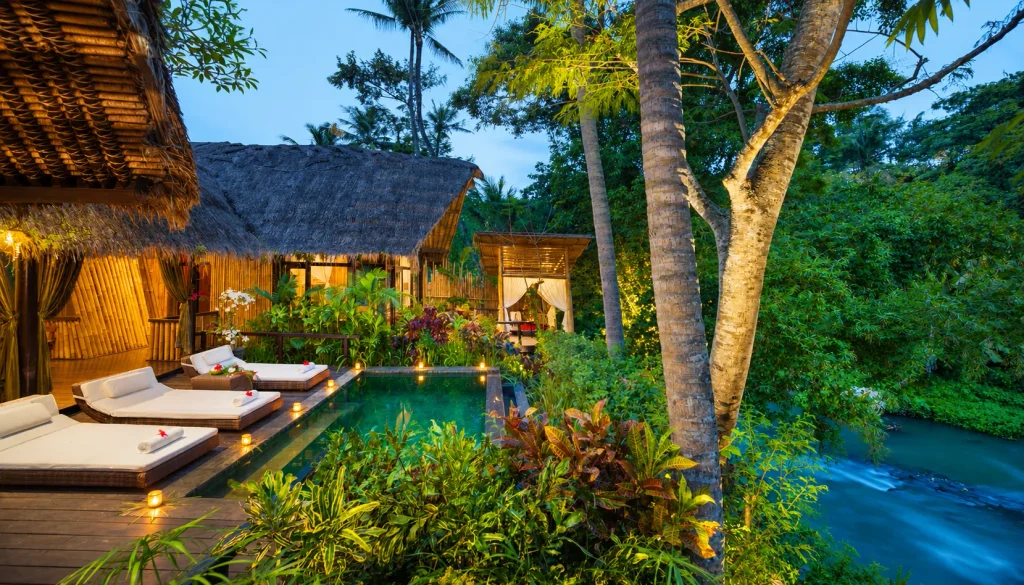 Riverside villa pool at an Ubud wellness retreat, a quiet counterpart to the coast on a Bali trip from Karachi