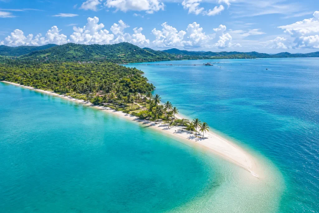 Aerial view of Koh Yao Noi's coastline, a quiet Andaman island for sustainable Thailand travel