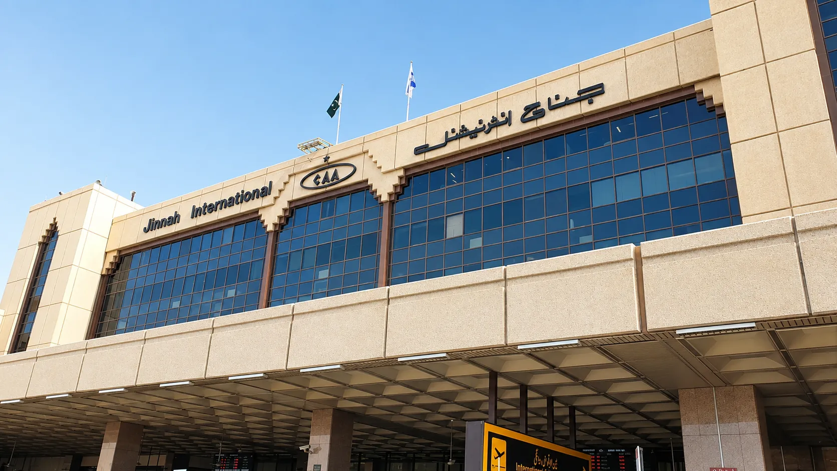 Travelers queuing at Karachi airport immigration counters for FIA document checks
