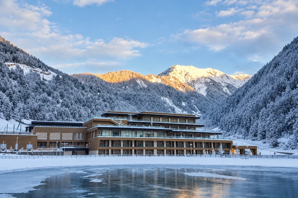 Mountain resort hotel at sunrise in the Greater Caucasus, a base to compare when planning Shahdag or Tufandag
