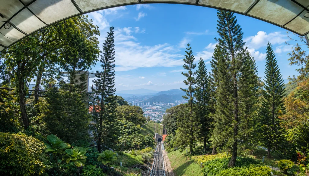 Penang Hill funicular track through green forest, a Malaysia stop for solo travel on a Pakistani passport